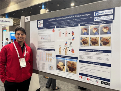 Student particpates in poster presentation