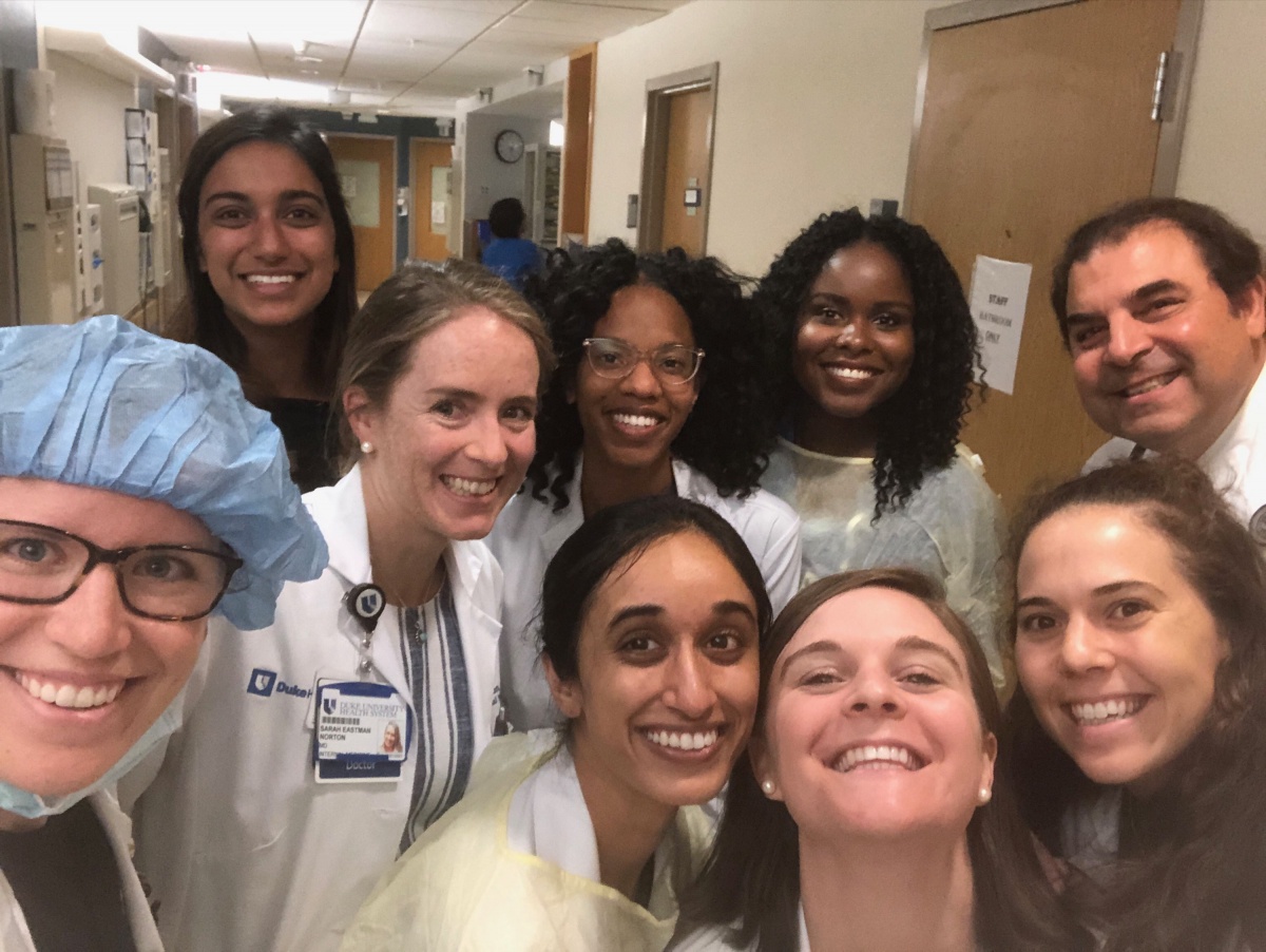 Residency team gathers for a group shot in the hallway.
