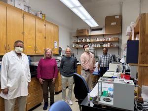 Dr. Hershfield in his lab with his associates
