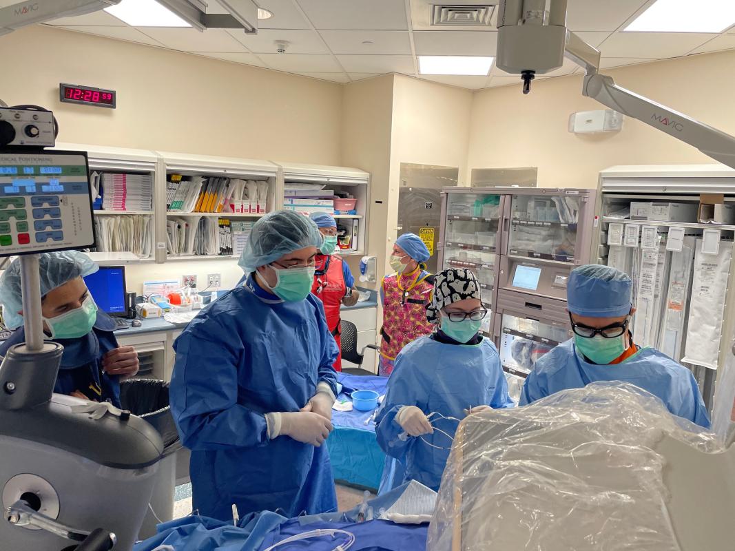 Drs. Marat Fudim, Zak Loring, and Imran Aslam with the first patient they performed the coronary sinus sampling during cardiac catheterization  