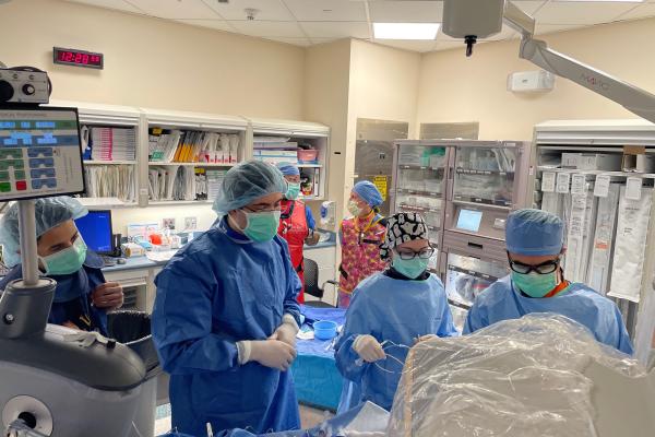 Drs. Marat Fudim, Zak Loring, and Imran Aslam with the first patient they performed the coronary sinus sampling during cardiac catheterization  
