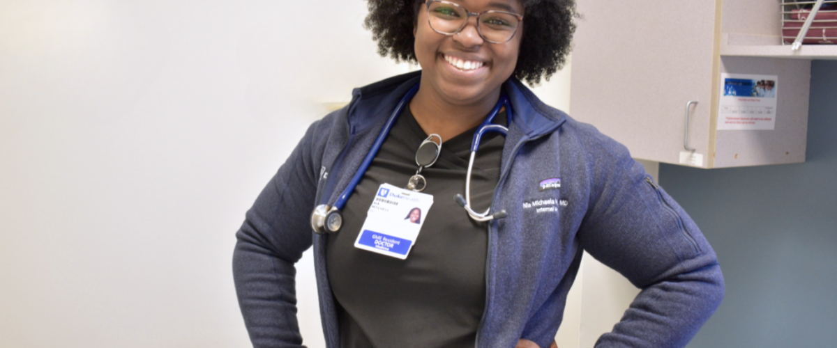 Smiling resident in a clinical setting.