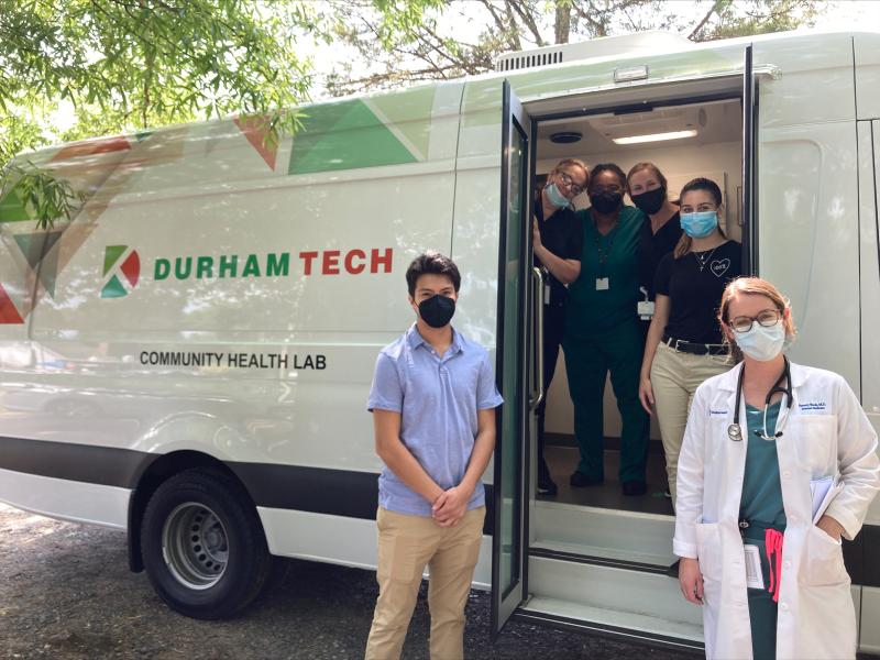 Resident Emory Buck, MD, and a Durham Tech crew of faculty and students prepare to go our for patient visits
