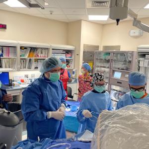Drs. Marat Fudim, Zak Loring, and Imran Aslam with the first patient they performed the coronary sinus sampling during cardiac catheterization  